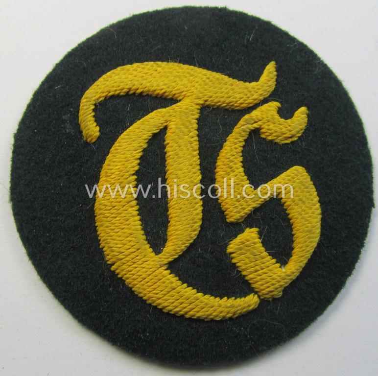 Superb - and truly rarely encountered! - WH (Heeres) hand-embroidered, trade- and/or special-career insignia (ie. 'Tätigkeitsabzeichen') as executed on a darker-green-coloured background as was specifically intended for a: 'Truppensattlermeister'