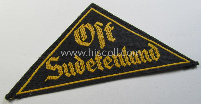 'HJ' ('Hitlerjugend') district-triangle (ie. 'Gebietsdreieck') entitled: 'Ost Sudetenland' (being a never used- nor worn example that still retains its period-attached 'RzM'-etiket)