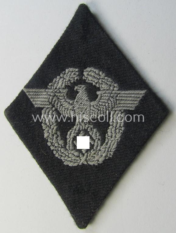 Superb, Waffen-SS-pattern, neatly 'BeVo'-woven and/or black-coloured sleeve-insignia (ie. 'Ärmelraute') depicting a so-called: 'Polizeiadler' as was used and intended to signify former membership within the: 'Polizei'