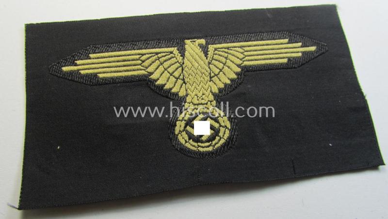 Mid- (ie. later-war-) pattern, 'SS' (ie. 'Waffen-SS') so-called: 'BeVo'-woven, enlisted-mens'- (ie. NCO-pattern) tropical-styled arm-eagle (ie. 'Tropen-Ärmeladler für Mannschaften u. Unterführer der Wa-SS') still retaining its 'RzM'-etiket