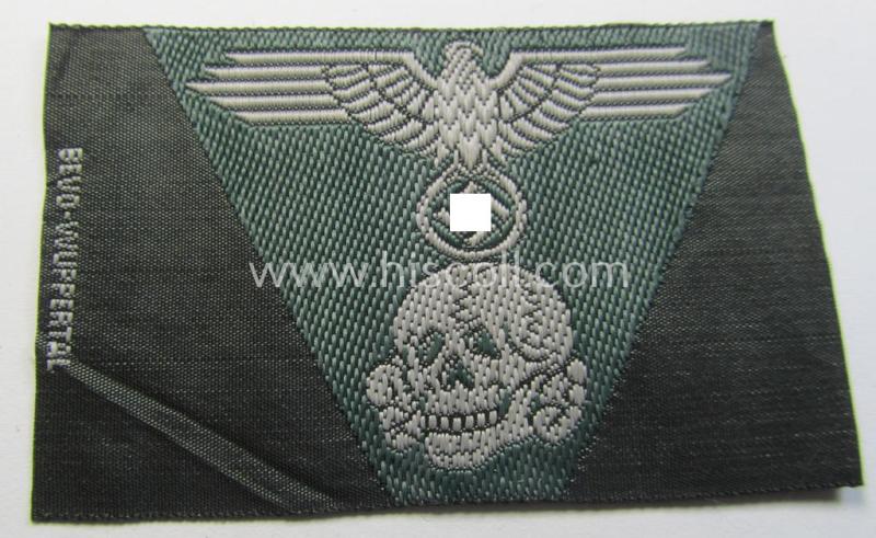 Superb - and simply never used nor cap-attached - Waffen-SS field-grey-coloured, M43-pattern cap-trapezoid as was intended for usage on the M43-model field-caps (ie. 'Einheitsfeldmützen') that comes in a 'virtually mint- ie. unissued', condition