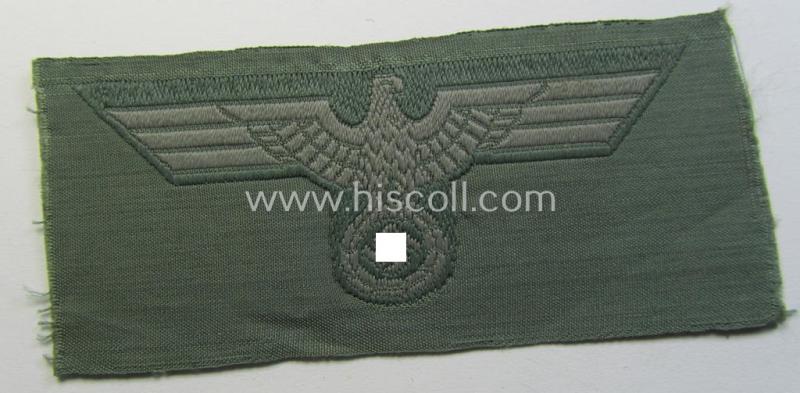 Early- (ie. mid-) war-period, WH (Heeres) cap-eagle (ie. 'Schiffchenmützen-Adler für Mannschaften u. Uffz.') being a 'virtually mint' example as executed in bluish-grey-coloured linnen on a field-grey-coloured background