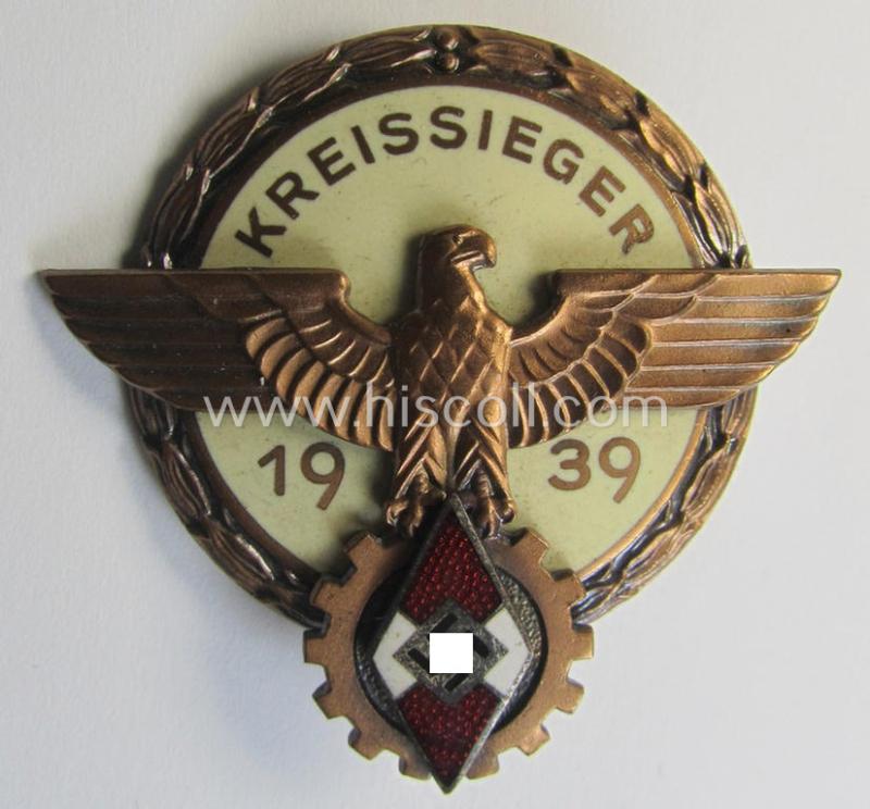 Superb, 'HJ'- ('Hitlerjugend') ie. 'BDM'- ('Bund Deutscher Mädel') related: 'Reichsberufswettkampf-Siegerabzeichen' (of the 2nd model) entitled: 'Kreissieger 1939' and being a neatly maker- (ie.: 'H. Aurich'-) marked example