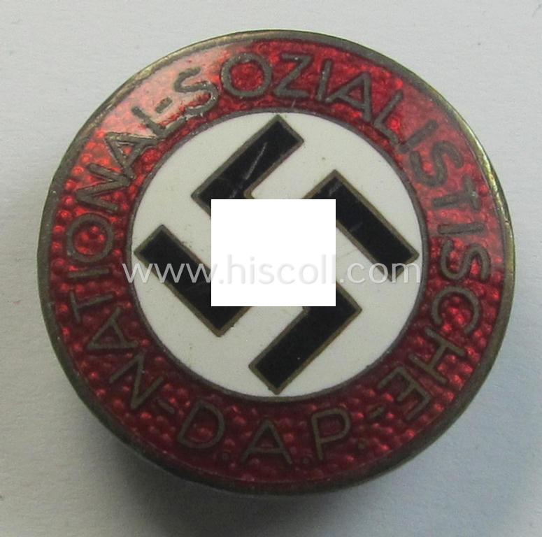 Neatly enamelled- (and bright-red-coloured!) 'N.S.D.A.P.'-membership-pin- ie. party-badge (or: 'Parteiabzeichen') which is nicely maker-marked on the back with the makers'-designation: 'RzM' and/or: 'M1/72'