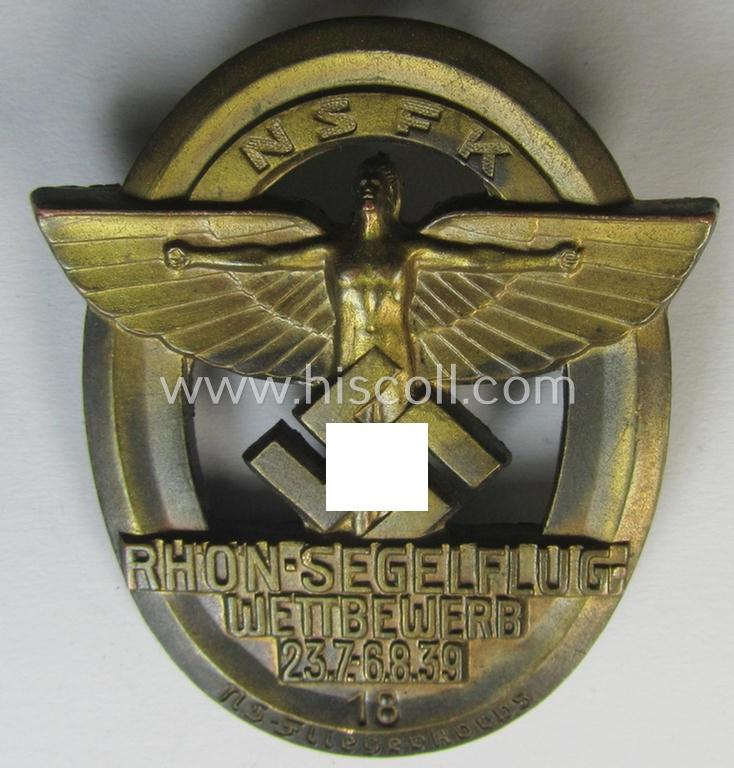 Golden-bronze-toned, N.S.F.K.-related day-badge (ie. 'tinnie') being a maker- (ie. 'G. Brehmer'-) marked example as was issued to commemorate a specific meeting ie. national rally entitled: 'N.S.F.K. Rhön-Segelflug Wettbewerb 23.7.-6.8.39'