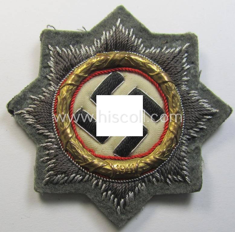 Superb - presumably issued albeit never worn! - example of a cloth version of a WH (Heeres o. Waffen-SS) 'Deutsches Kreuz im Gold' (ie. DKiG or German Cross in gold) that comes in an overall very nice- (ie. 'virtually mint'!), condition