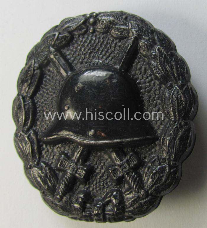 WWI-pattern, black-class wound-badge (ie.: 'Verwundeten Abzeichen in Schwarz') being a very detailed (and magnetic) example that comes in a just minimally used- ie. most certainly worn, condition