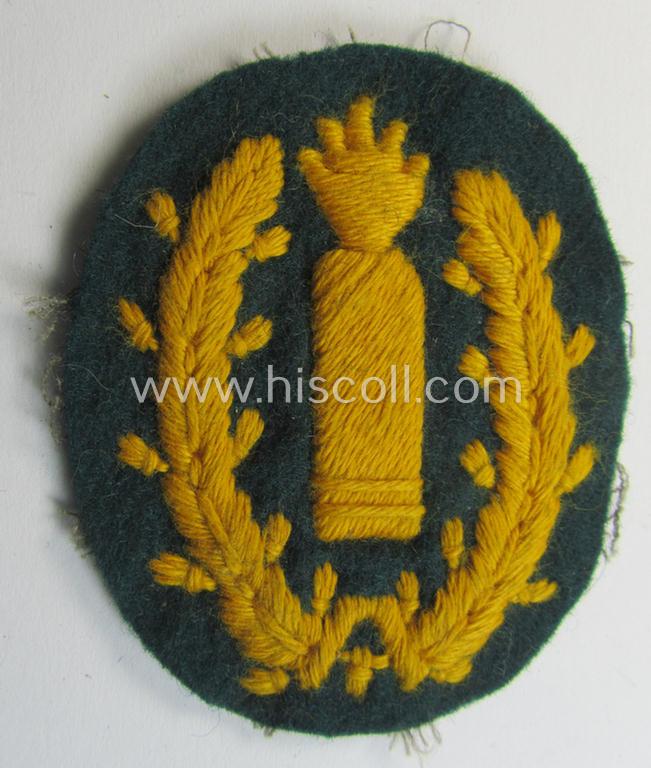 Neat - just moderately used- and/or worn! - example of a WH (Heeres) 'Richtabzeichen für Artillerie-Richtkannoniere' (or: artillery gun-layers patch) as executed in the machine- (ie. hand?) embroidered-pattern (and that comes in a wonderful condition)