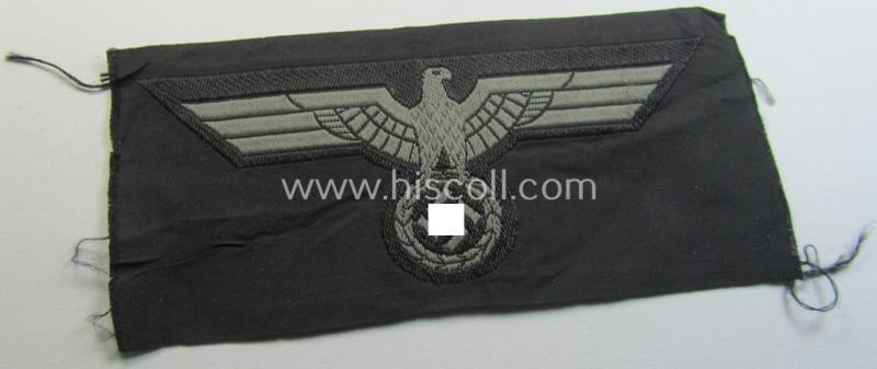 Later- (ie. mid-war-) period, WH (Heeres) 'Panzer'-type breast-eagle (ie. 'Brustadler für Panzertruppen') being a 'virtually mint- ie. unissued' example as executed in bluish-grey-coloured linnen on a black-coloured background