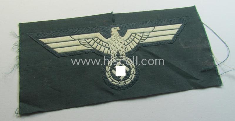 'Virtually mint ie. unissued' example of a WH (Heeres) early- (ie. pre-war-) period- and/or white-coloured breast-eagle of the: 'M36'- (ie. 'M40'-) pattern as was executed in the 'BeVo'-weave pattern on a darker-green-coloured background