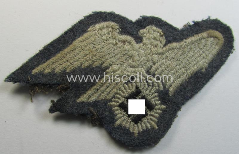 Attractive - and scarcely encountered! - EM- (ie. NCO-) pattern, so-called: 'Luftschutz' (ie. RLB-) breasteagle, being a machine-embroidered example that is executed on a bluish-grey-coloured- and/or woolen-based background