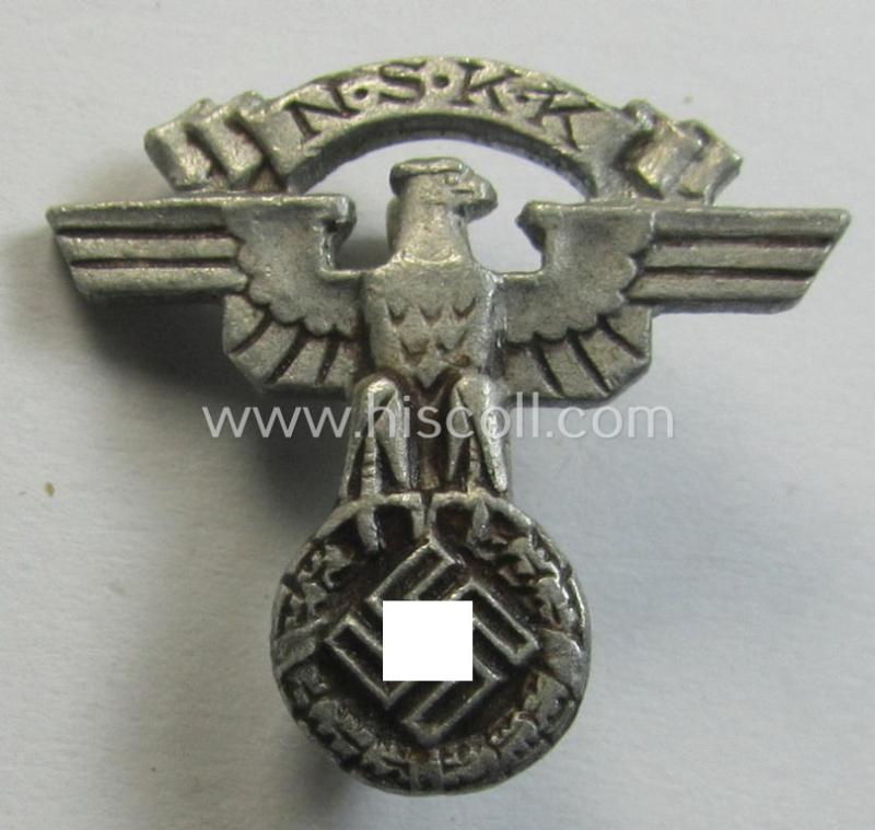 Neat, N.S.K.K. (or: 'National Socialistisches Kraftfahr Korps') 'molded'-aluminium-based, so-called: 'Mitgliedsabzeichen' (or: membership-lapel-pin) being an example that bears an 'RzM - M1/24'-makers-designation on its back