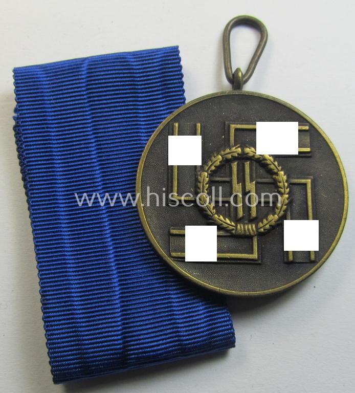 Superb - and actually rarely encountered! - 'SS-Dienstauszeichnung der 3. Stufe' (or bronze-toned, loyal-service medal for 8 years of loyal-service in the SS) that comes together with its original (and never mounted!) ribbon (ie. 'Bandabschnitt')