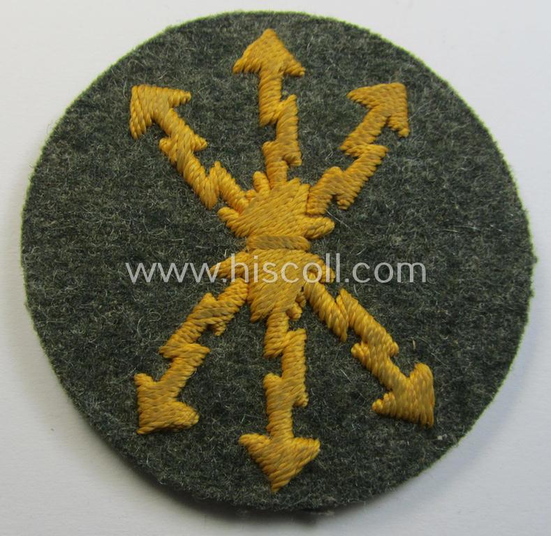 Attractive, WH (Heeres) so-called: trade- and/or special-career arm-insignia as was intended for a: 'Funkmeister' being a neatly hand-embroidered (and non-marked) specimen on a field-grey-coloured woolen-based background