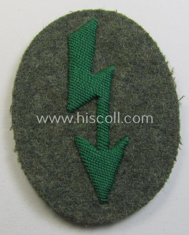 WH (Heeres) trade- and/or special-career-insignia ie. hand-embroidered 'signal-blitz' being a non-maker-marked example as executed in green-coloured linnen as was specifically intended for a soldier within the: 'Jäger- o. Geb.Jäger-Truppen'