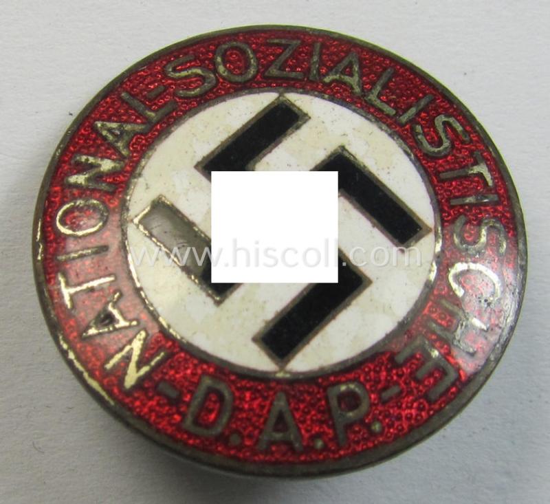Neat - bright-red-coloured and nicely preserved! - 'N.S.D.A.P.'-membership-pin- ie. party-badge (or: 'Parteiabzeichen') which is maker-marked on its back with the makers'-designation: 'RzM' and/or: 'M1/63'