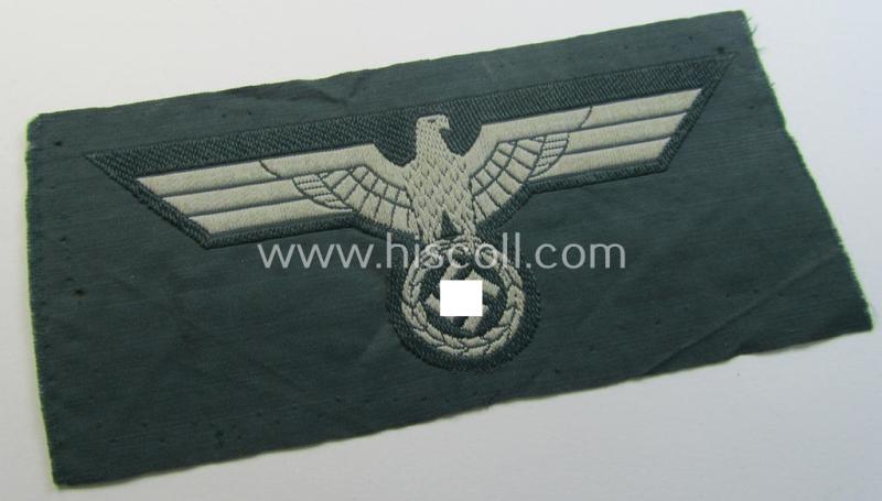 'Virtually mint ie. unissued' example of a WH (Heeres) early- (ie. pre-war-) period- and/or greyish-coloured breast-eagle of the: 'M36'- (ie. 'M40'-) pattern as was executed in the 'BeVo'-weave pattern on a darker-green-coloured background