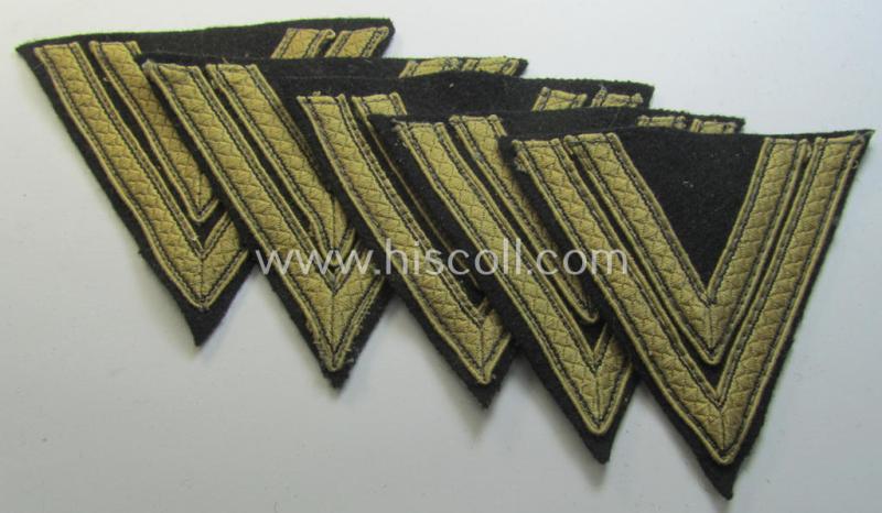 Attractive, Waffen-SS-type 'Armwinkel' (or: rank-chevron) as executed on black-coloured wool as was specifically intended for usage by an SS-soldier with the rank of: 'SS-Rottenführer'