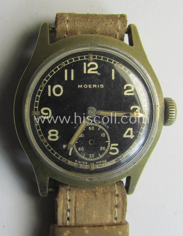 Regrettably incomplete, WH (Heeres, LW etc.) WWII-period wrist-watch (or: 'Dienstuhr') of the make: 'Moeris' having an engraved number: '2655962' on its back (and that comes in a non-functional ie. non-running condition)