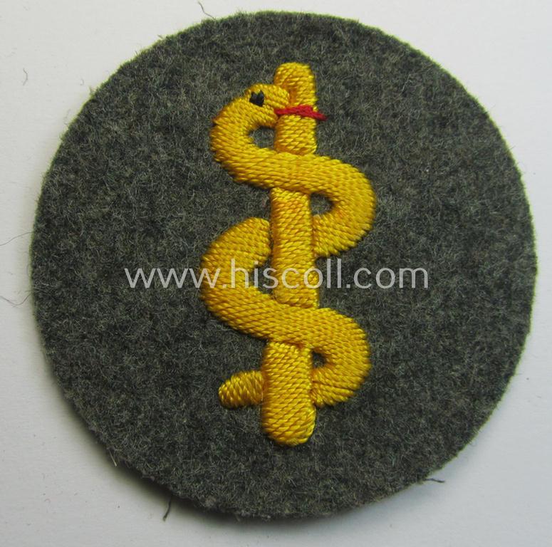 Neatly hand-embroidered, WH (Heeres) trade- and/or special-career insignia (ie.: 'Heeres-Tätigkeitsabzeichen') as was specifically intended for usage by: 'Sanitätspersonal' (or: medical orderlies- ie. staff)