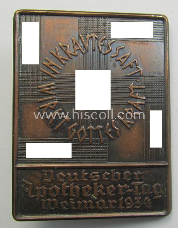 Attractive, darkened bronze-toned- (and I deem typical copper-toned & 'Eisen'-based) so-called: N.S.D.A.P.-related day-badge (ie. 'tinnie' or: 'Veranstaltungsabzeichen') as was issued to commemorate the: 'Deutscher Apotheker-Tag - Weimar - 1934'