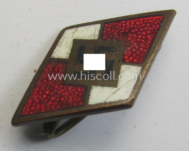 Clearly worn, HJ (ie. 'Hitlerjugend') enamelled lapel-pin (ie.: 'Raute') being a bright-red-coloured- and/or detailed - and non-cleaned and untouched! - example showing an: 'RzM - M1/93'-makers'-designation on its back