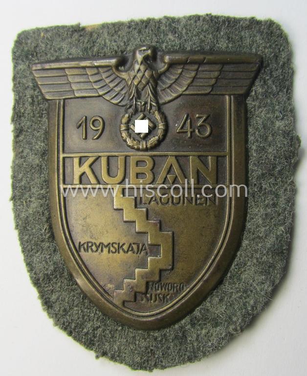 Attractive - and actually scarcely encountered! - WH (Heeres ie. Waffen-SS) 'Kuban'-campaign-shield that comes mounted onto its original field-grey-coloured- and/or woolen-based 'backing'