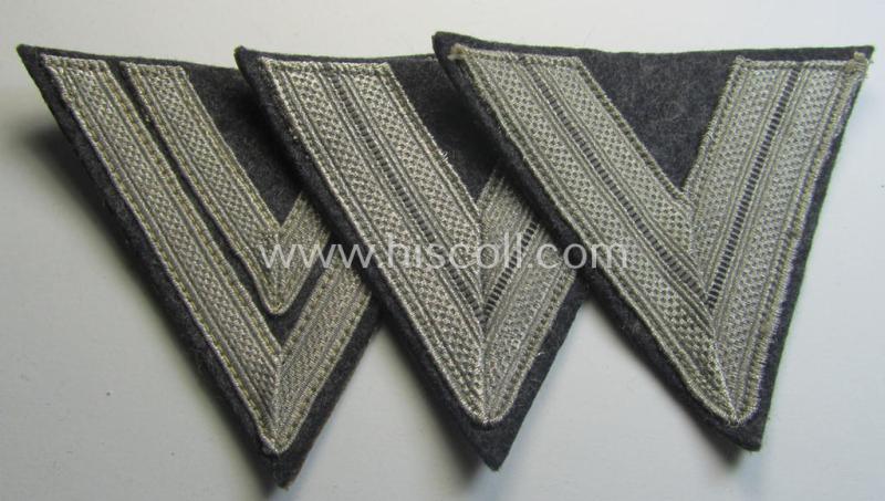 Neat, WH (Luftwaffe) 'Armwinkel' (or: arm-chevron) as executed on typical bluish-grey-coloured wool as was specifically intended for usage by a soldier holding the rank of: 'Obergefreiter'