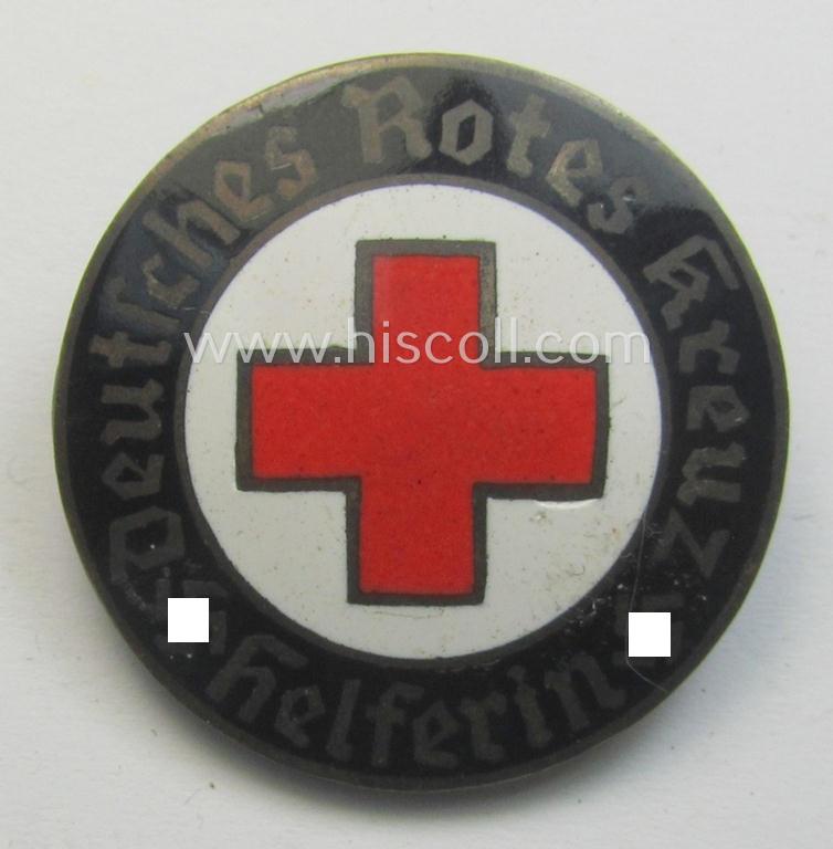 Attractive - and just moderatelty used! - example of a DRK (ie. 'Deutsches Rotes Kreuz' or German Red Cross) nurses'-badge as was intended for a: 'Helferin' being a maker- (ie. 'F.O.-) marked example that comes in a fully untouched condition