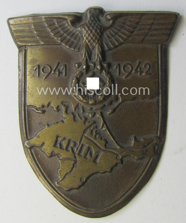 Regrettably incomplete - but nevertheless nicely preserved! - WH (Heeres ie. Waffen-SS etc.) 'Krim'-campaign-shield (as was produced by a by me unidentified maker) and that comes in a clearly issued- ie. moderately used, condition