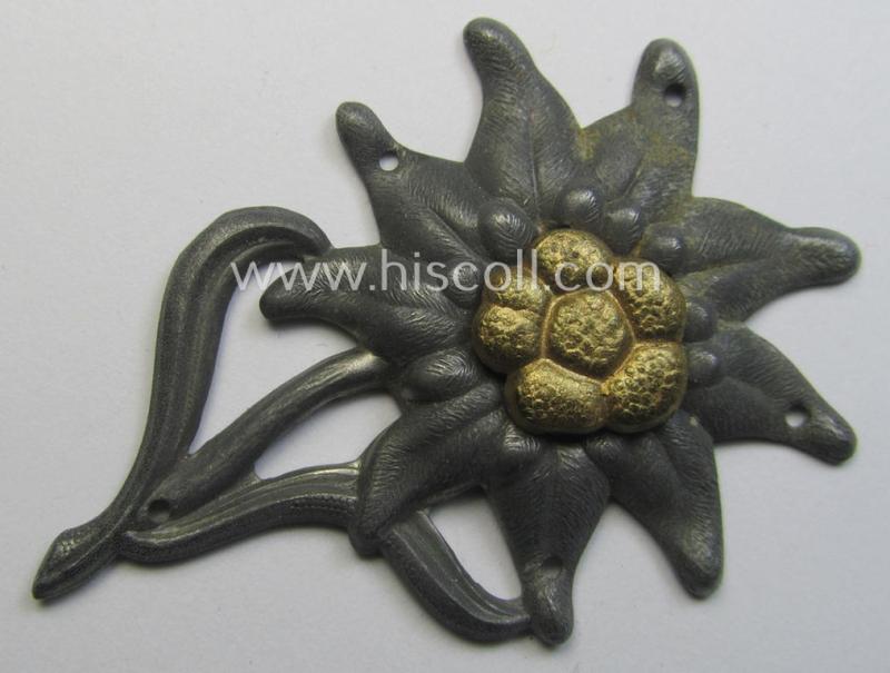 WH (Heeres) silver-greyish-coloured and zinc-based (albeit non-maker-marked) so-called: M43-cap-badge (ie. 'Mützenabzeichen') depicting an: 'Edelweiss'-flower as was used by the various 'Gebirgsjäger'- (ie. mountain-troops-) related divisional-staff