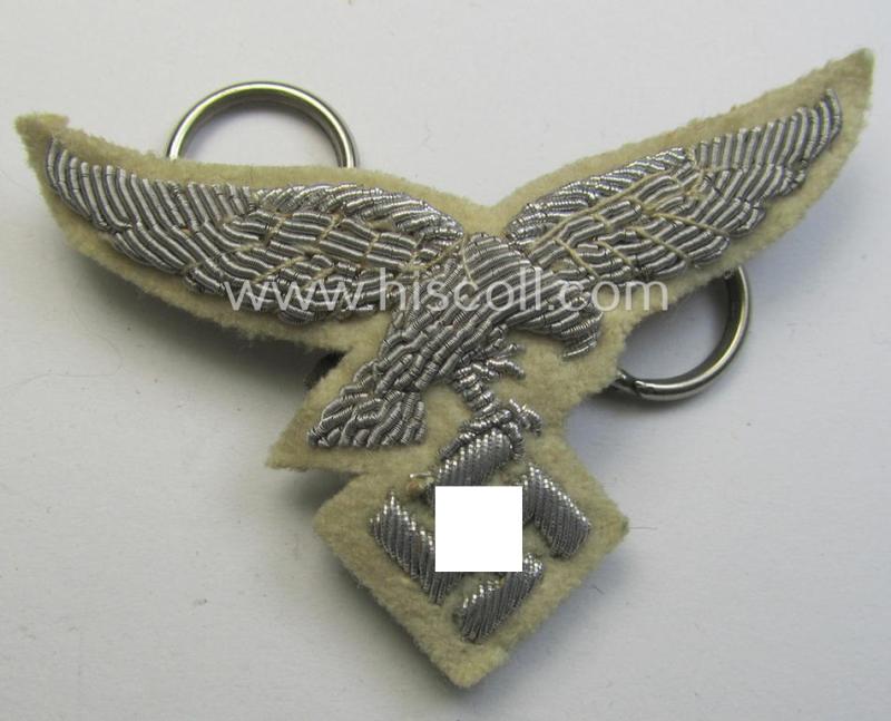 Superb - and rarely seen! - WH (Luftwaffe) officers'-type visor-cap eagle that is neatly hand-embroidered on beige-white-coloured wool as was specifically used for the white-topped LW officers'-type visor-caps (ie. 'Sommer-Schirmmützen')
