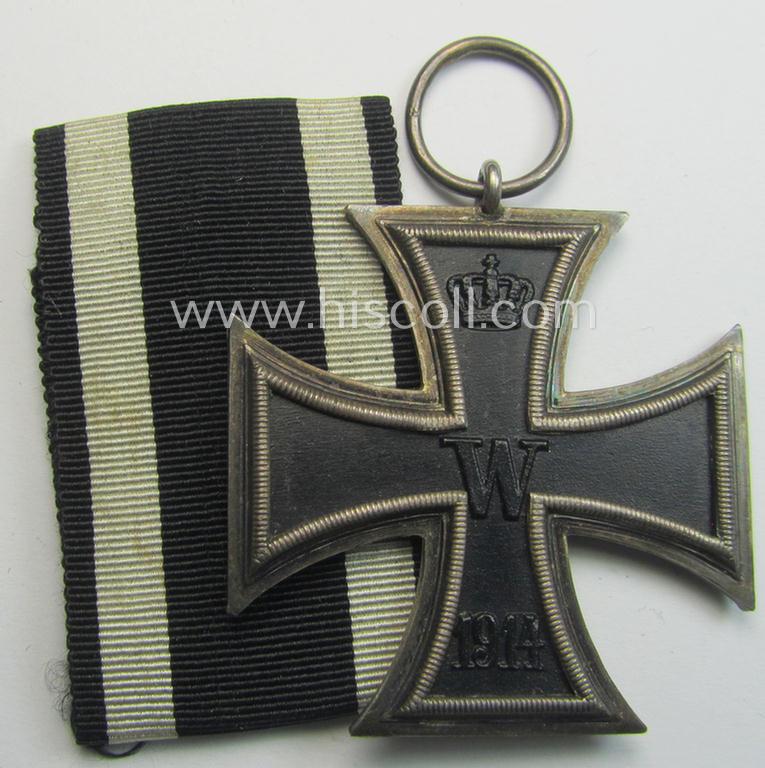 Attractive, WWI-period: 'Eisernes Kreuz II. Klasse' (or: iron cross second class) being a non-maker-marked example that comes together with its (minimally) confectioned piece of ribbon (ie. 'Bandabschnitt')