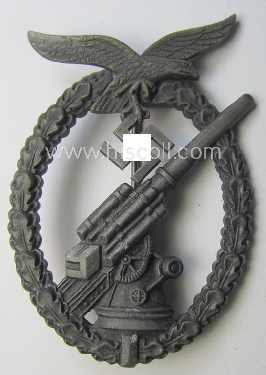 Attractive - and actually not that often seen! - 'Feinzink'-based example of a mid-war-period- and non-maker-marked WH (Luftwaffe) 'Flakkampfabzeichen' (or: airforce anti-aircraft badge) as was produced by a to date unknown maker