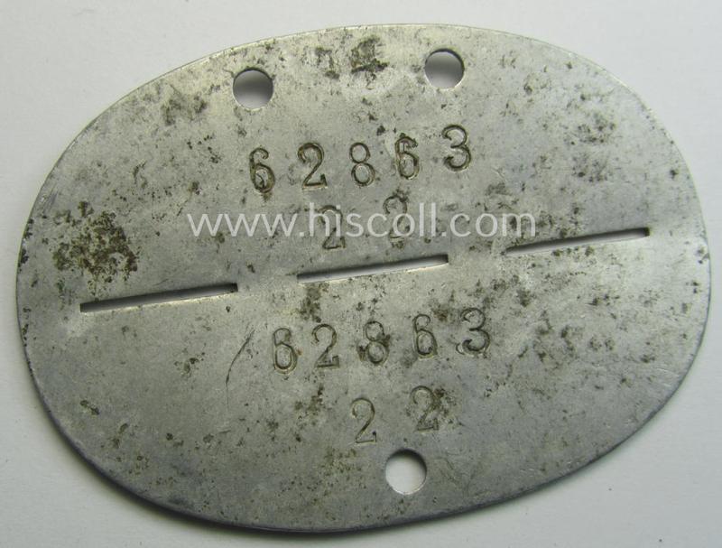 Aluminium-based, WH (LW) ie. 'Fallschirmjäger'-related ID-disc, bearing the 'coded'-unit- ie. 'MOB'-designation: '62863' (and as such belonging to a soldier who served within the: 'II./Fsch.-Jäg.Rgt. 2, Stab u. Nachr.Zug')