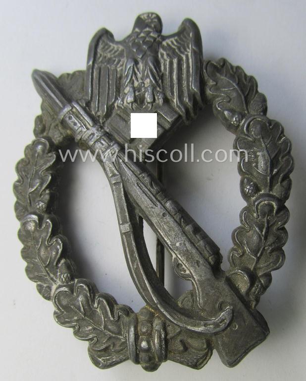 Attractive, 'Infanterie Sturmabzeichen in Silber' (or: silver infantry assault badge ie. IAB) being a nicely maker- (ie. 'A'-) marked example as executed in zinc-based metal (ie. 'Feinzink') as was produced by the: 'Assmann & Söhne'-company