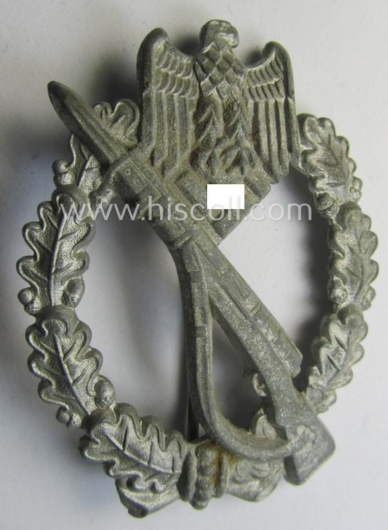 Neat 'Infanterie Sturmabzeichen in Silber', being an unmarked (and/or very converse- ie. vaulted-) 'hollow-back' example by the maker: 'Friedrich Linden' (ie. 'F.L.L.') as was executed in silver-coloured, zinc-based metal (ie. 'Feinzink')