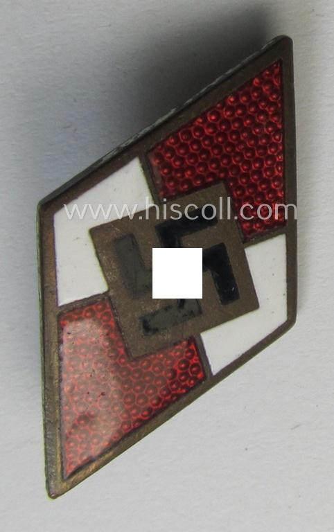Moderately worn, HJ (ie. 'Hitlerjugend') enamelled lapel-pin (ie.: 'Raute') being a bright-red-coloured- and/or detailed - and non-cleaned and untouched! - example showing an: 'RzM - M1/63'-makers'-designation