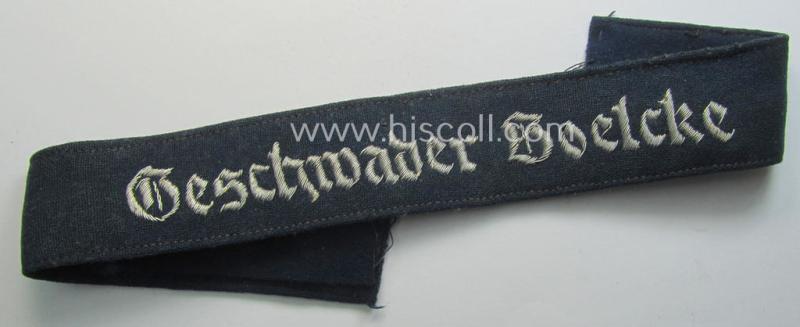 Superb example of a WH (Luftwaffe) cuff-title (ie. 'Ärmelstreifen') entitled: 'Geschwader Boelcke' (being a typical, hand-embroidered officers'-pattern example that comes in a truly worn ie. period-shortened-, condition as found)