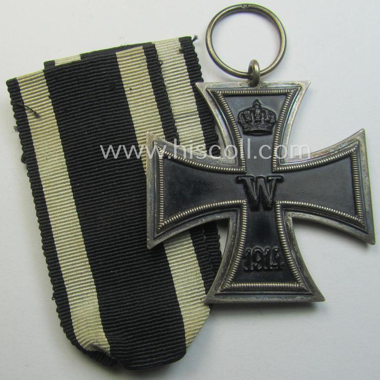 Attractive, WWI-period: 'Eisernes Kreuz II. Klasse' (or: iron cross second class) being a maker- (ie. 'O'-) marked example that comes together with its (minimally) confectioned piece of ribbon (ie. 'Bandabschnitt')