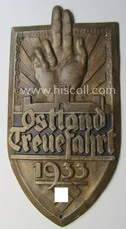 Unusual, commemorative 'N.S.K.K.- o. A.D.A.C.'-related car-plaque (ie. 'Erinnerungs- o. nichttragbare Kraftwagenplakette') showing a upright-positioned hand, swastika and text: 'Ostland Treuefahrt 1933'