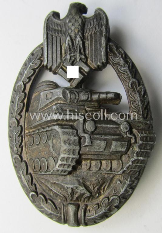 Attractive - and moderately used! - 'Panzerkampfabzeichen in Bronze' (or: bronze-class panzer-assault badge or PAB) being a non-maker-marked- and/or hollow zinc- (ie. 'Feinzink'-) based example as was produced by the: 'Wilh. Deumer'-company