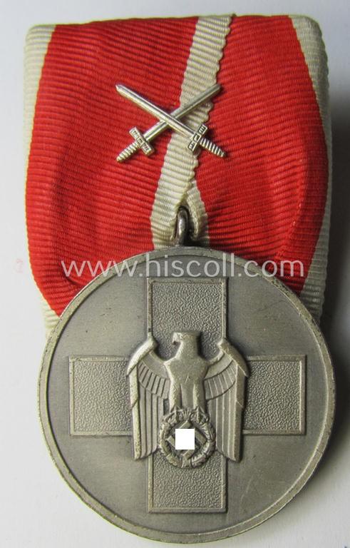 Superb - and actually rarely seen! - single-pieced and non-detachable, single-pieced medal-bar (ie. 'Orden- o. Einzelspange') showing a: 'Deutsche Volkspflege'- (ie. civil-service-) medal with silver-toned swords-device