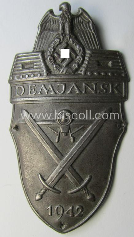 Attractive - truly used- and regrettably incomplete - example of a WH (Heeres ie. Waffen-SS) 'Demjansk'-campaign-shield as executed in typical magnetic, so-called: 'Eisenblech' (and being of the 'missing-log' variant-pattern)