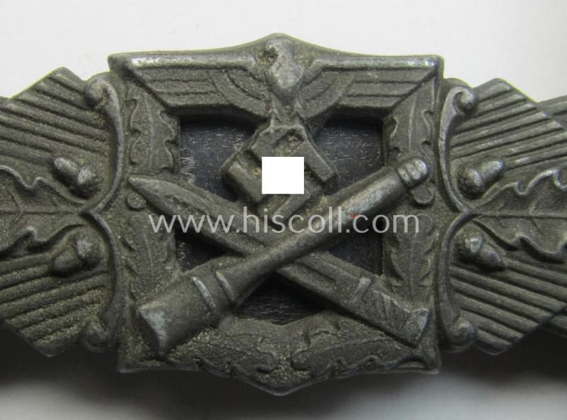 'Nahkampfspange in Bronze' (or: bronze-class close-combat clasp ie. CCC) being a maker- (ie. 'FLL'-) marked- and truly converse-shaped so-called: '3rd pattern'-specimen as was produced by the maker- (ie. 'Hersteller') 'Friedrich Linden'