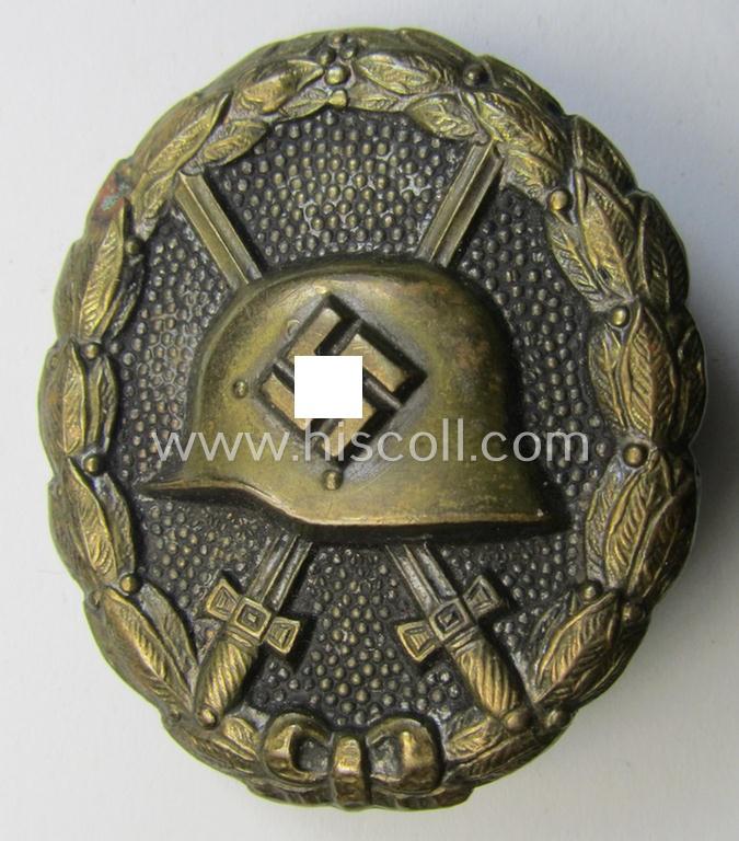 Attractive, early-pattern, black-class wound-badge (ie.: 'Verwundeten Abzeichen in Schwarz') being a detailed so-called: 'Spanish Civil-War'-version that comes in a moderately used- and/or worn, condition