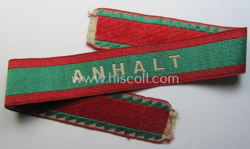 Attractive - and truly rarely found! - colourful 'BeVo'-woven, RAD (ie. 'Reichsarbeitsdienst') officers'-pattern, commemorative cuff-title (ie. 'Dienstärmelstreifen') depicting the text: 'Anhalt'