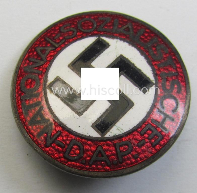 Attractive - bright-red-coloured and nicely preserved! - 'N.S.D.A.P.'-membership-pin- ie. party-badge (or: 'Parteiabzeichen') which is maker-marked on its back with the makers'-designation: 'RzM' and/or: 'M1/102'