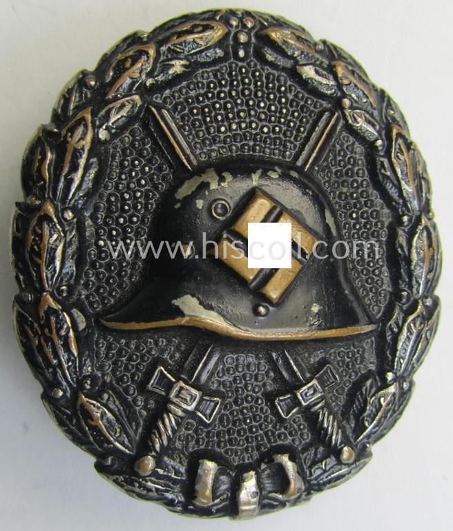 Attractive, early-pattern, black-class wound-badge (ie.: 'Verwundeten Abzeichen in Schwarz') being a detailed so-called: 'Spanish Civil-War'-version that comes in a moderately used- and/or worn, condition