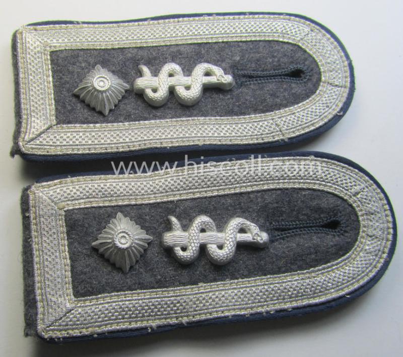 Attractive - and/or fully matching! - neatly 'cyphered' pair of WH (Luftwaffe) NCO-type shoulderstraps as piped in the darker-blue-coloured branchcolour as was intended for a: 'Feldwebel der Sanitäts-Truppen'